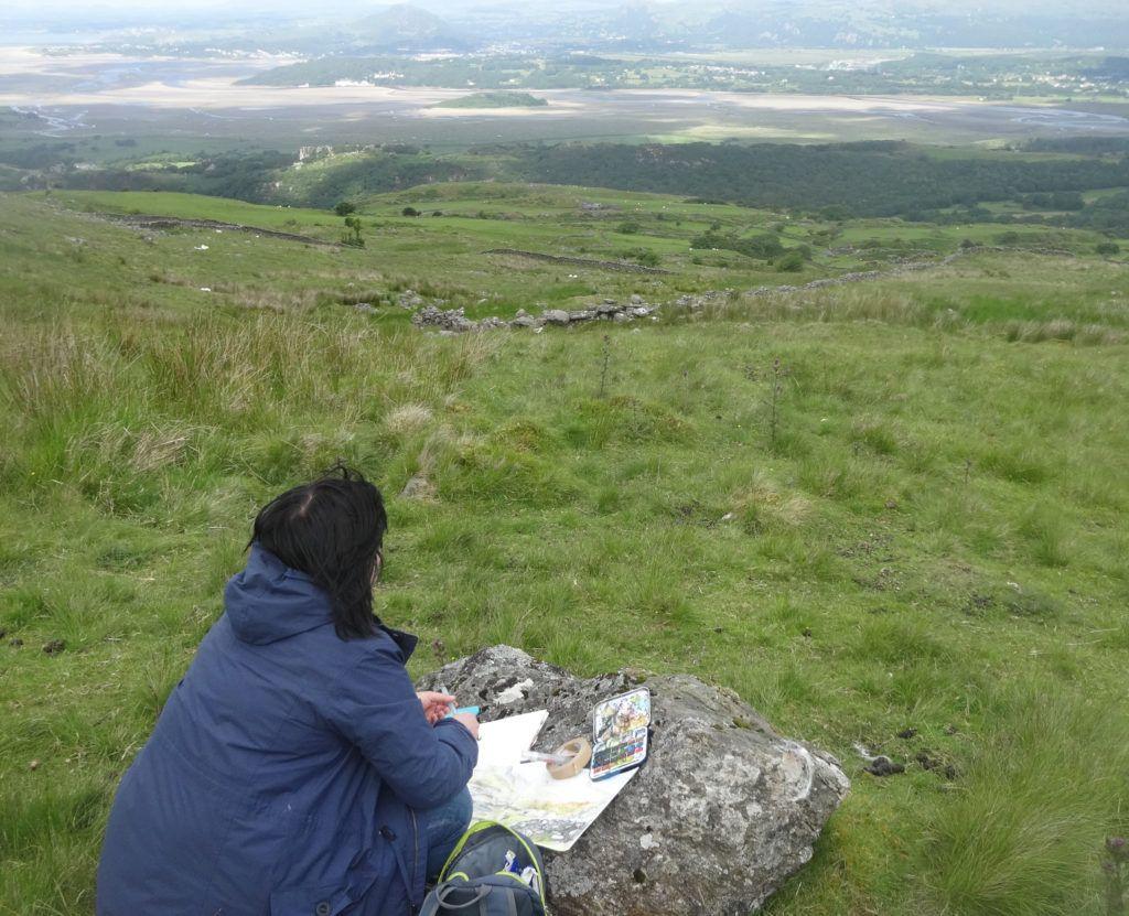 Ended up using a well-placed boulder as an easel and anchored the paper down with anything I could as it was very windy up there!