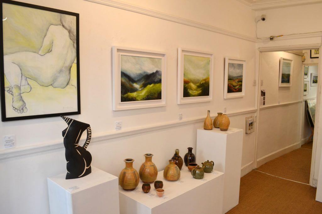 'Sam', 'Pasture', 'Rain Over Littondale' and 'Walking Home' with ceramics by Jude and John Jelfs