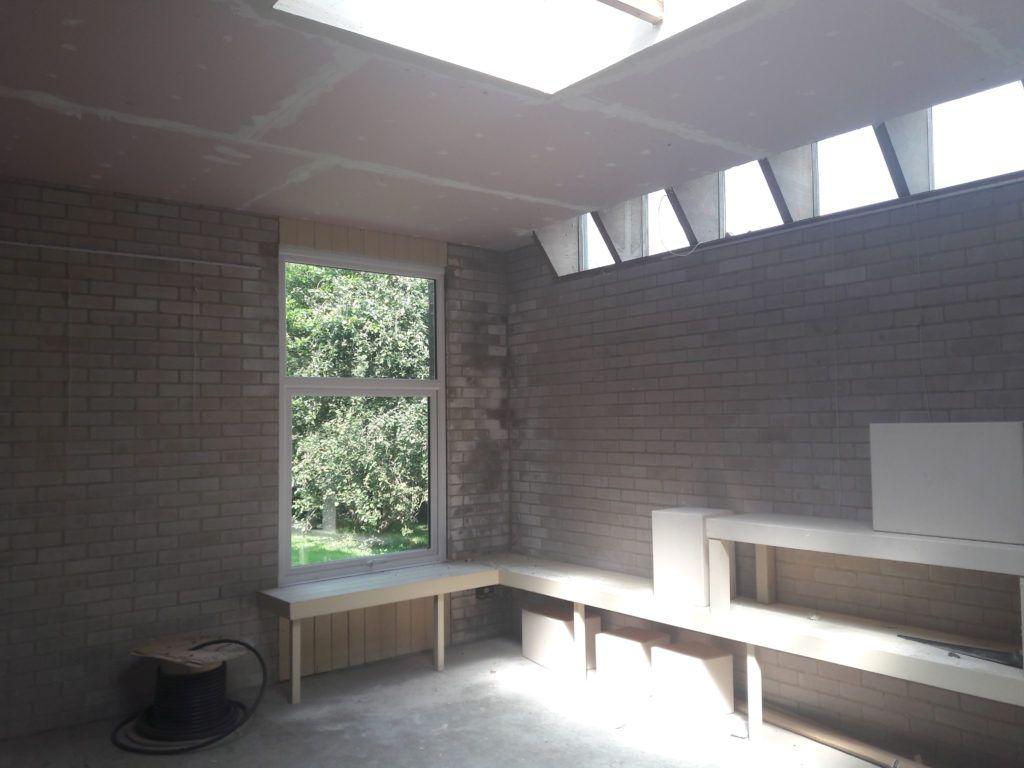 High level north-facing windows and a large roof lantern let in plenty of natural light