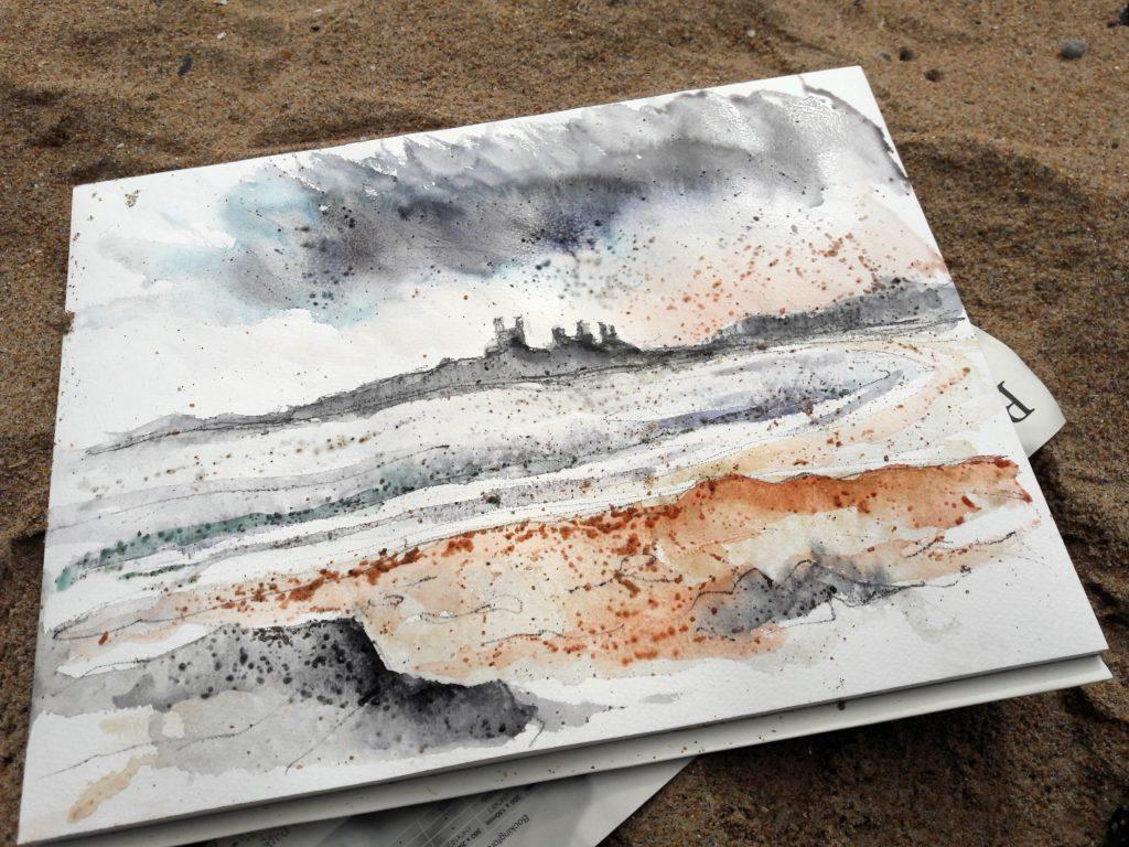 A long walk to Dunstanburgh Castle, so took my lightweight kit – watercolours and graphite. Sand added interesting textures. It was a showery day and dark clouds loomed overhead.
