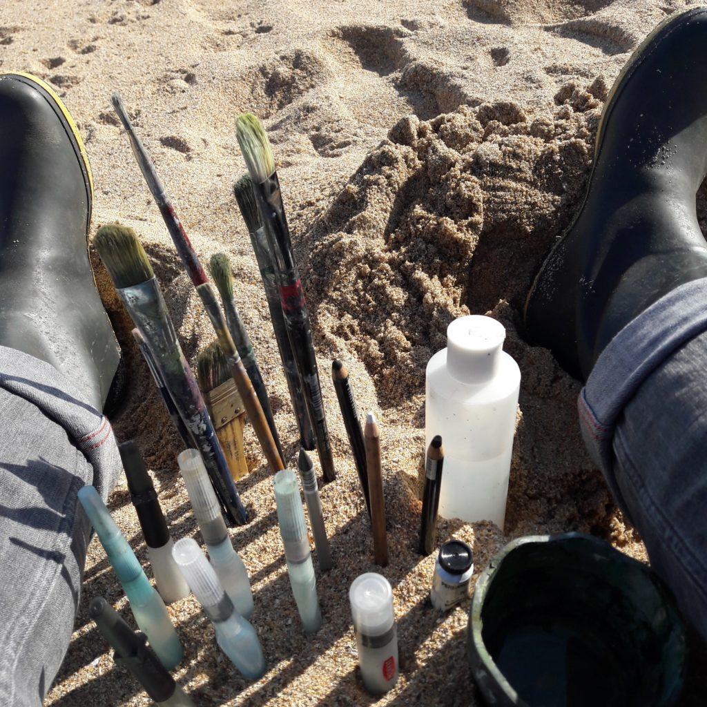 Sand makes an excellent brush holder for working en plein air!