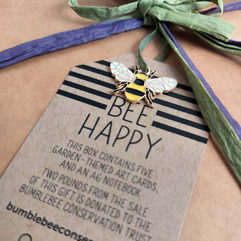 The cute little charm is a (bee)keeper!